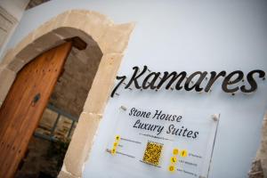 a sign for a home houseancy clinic on a wall at 7Kamares in Pano Lefkara