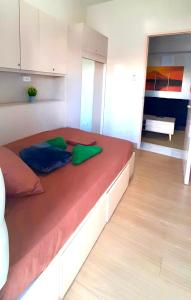 Postel nebo postele na pokoji v ubytování 2br Unit at Asmara-near St Luke's + 7 fotografií