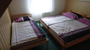 Postel nebo postele na pokoji v ubytování Chatka č. 6
