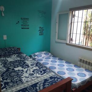 En eller flere senger på et rom på Chalet La Mimosa
