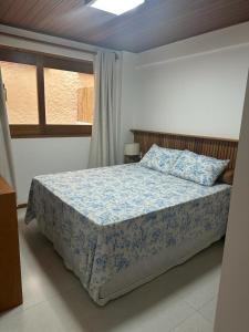 Giường trong phòng chung tại Villa Andorinha, Apt 03