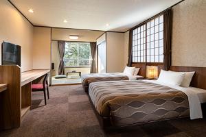 Postel nebo postele na pokoji v ubytování HESTA Hakone - GUEST HOUSE - + 20 fotografií