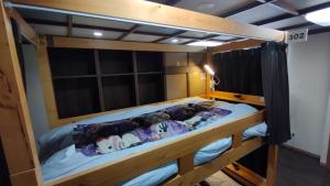Postel nebo postele na pokoji v ubytování HESTA Hakone - GUEST HOUSE -