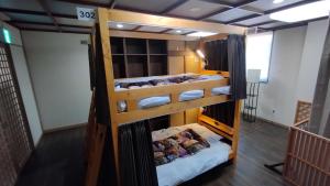 Postel nebo postele na pokoji v ubytování HESTA Hakone - GUEST HOUSE -