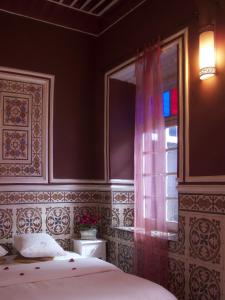 Postel nebo postele na pokoji v ubytování Casa Lila & Spa