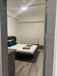 Cama o camas de una habitación en En-suite room