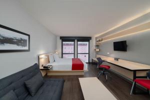TV a/nebo společenská místnost v ubytování City Express by Marriott Silao Aeropuerto