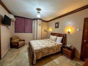 Letto o letti in una camera di Hotel Bucaneiro