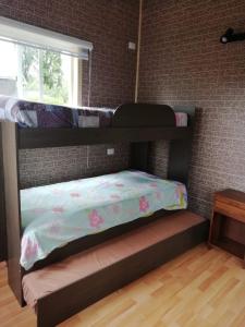 Dviaukštė lova arba lovos apgyvendinimo įstaigoje Casa para 7