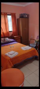 Postel nebo postele na pokoji v ubytování CASA LOS CERROS LR