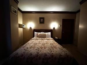 Letto o letti in una camera di Hotel Bucaneiro