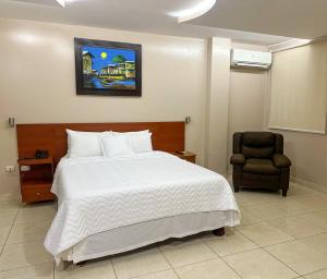 Letto o letti in una camera di Hotel Bucaneiro