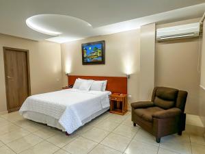 Letto o letti in una camera di Hotel Bucaneiro