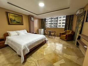Letto o letti in una camera di Hotel Bucaneiro