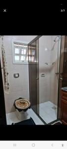 Een badkamer bij Quarto _ Temporada , Feriados_ Torres RS
