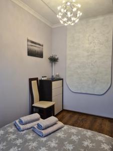 Postel nebo postele na pokoji v ubytování Zatrzymaj się w Toruniu