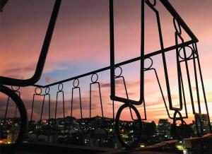 a view of a city skyline at sunset at Alojamiento Cuarto Espiral in Manizales