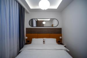 Voodi või voodid majutusasutuse Apartman G1 toas