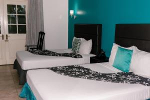 Katil atau katil-katil dalam bilik di Grand Hotel Excelsior Port Royal