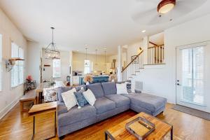 a living room with a couch and a table at Oakley Hollow in Nashville