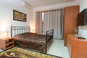 Postel nebo postele na pokoji v ubytování Hotel Rothschild 37