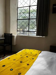 Letto o letti in una camera di Hotel Maculís