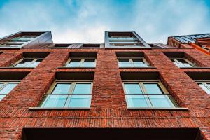 a tall brick building with windows on the side at Ropewalks Hotel - BW Premier Collection in Liverpool