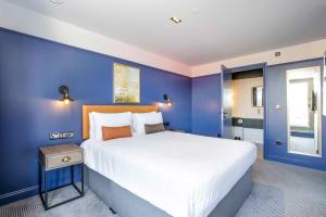 Postel nebo postele na pokoji v ubytování Ropewalks Hotel