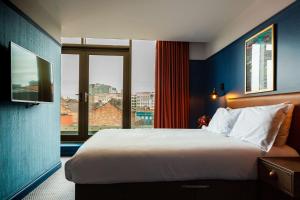 Postel nebo postele na pokoji v ubytování Ropewalks Hotel