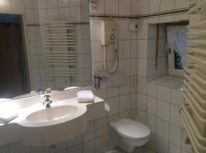 Ein Badezimmer in der Unterkunft Hotel Hungerkamp