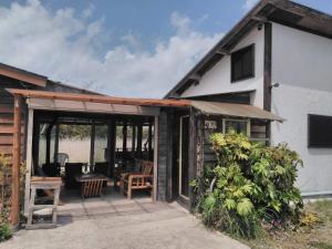an extension to a house with a patio at Rustic Resort Isumi / Vacation STAY 5447 in Isumi