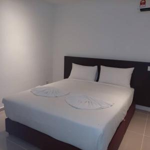 Postel nebo postele na pokoji v ubytování One Dream Hotel