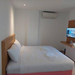 Postel nebo postele na pokoji v ubytování One Dream Hotel