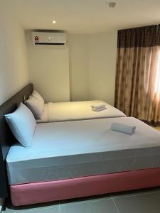 Postel nebo postele na pokoji v ubytování One Dream Hotel