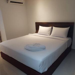 Postel nebo postele na pokoji v ubytování One Dream Hotel