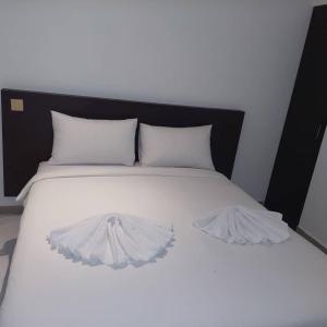 Postel nebo postele na pokoji v ubytování One Dream Hotel