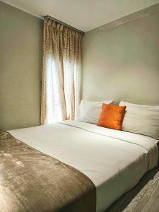 Postel nebo postele na pokoji v ubytování Pearl Rice Garden （cottage style）米樂坊頂層田园式高级公寓