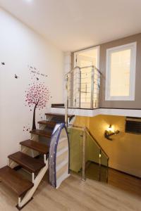 Fotografie z fotogalerie ubytování Pearl Rice Garden （cottage style）米樂坊頂層田园式高级公寓 v destinaci Sekincan
