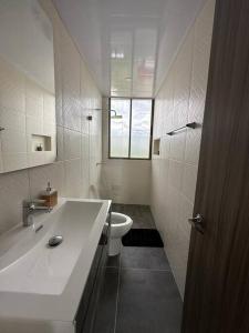 Koupelna v ubytování Apartamento Tiziano Resort