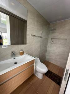 Koupelna v ubytování Apartamento Tiziano Resort