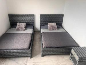 Postel nebo postele na pokoji v ubytování Apartamento Tiziano Resort
