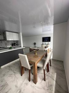 Kuchyň nebo kuchyňský kout v ubytování Apartamento Tiziano Resort