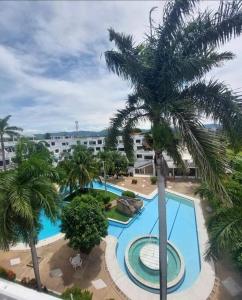 Bazén v ubytování Apartamento Tiziano Resort nebo v jeho okolí