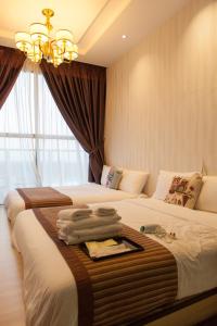 Voodi või voodid majutusasutuse Pearl Rice Garden Japanese Style 米樂坊頂層日式高级公寓 toas