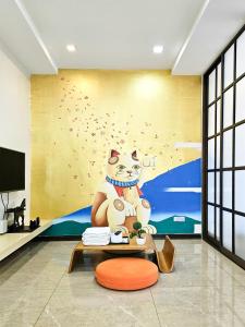 Televiisor ja/või meelelahutuskeskus majutusasutuses Pearl Rice Garden Japanese Style 米樂坊頂層日式高级公寓