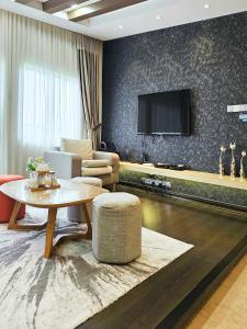 TV a/nebo společenská místnost v ubytování Pearl Rice Garden Japanese Style 米樂坊頂層日式高级公寓