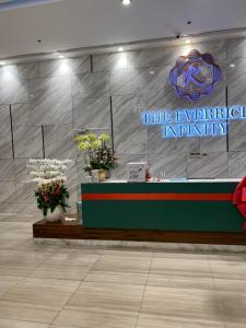a flower shop with a sign that says the entrepreneur infinity at The Everich Infinity 290 ADV in Ho Chi Minh City