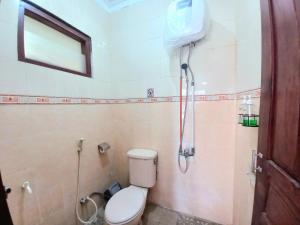 Koupelna v ubytování Homestay Jogja Condongcatur by Simply Homy
