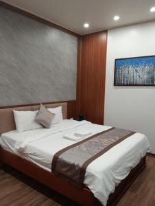Säng eller sängar i ett rum på Tam Đảo Hotel
