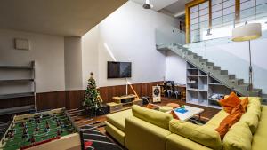 a living room with a couch and a table at Ocean Front Villa Nha Trang in Nha Trang